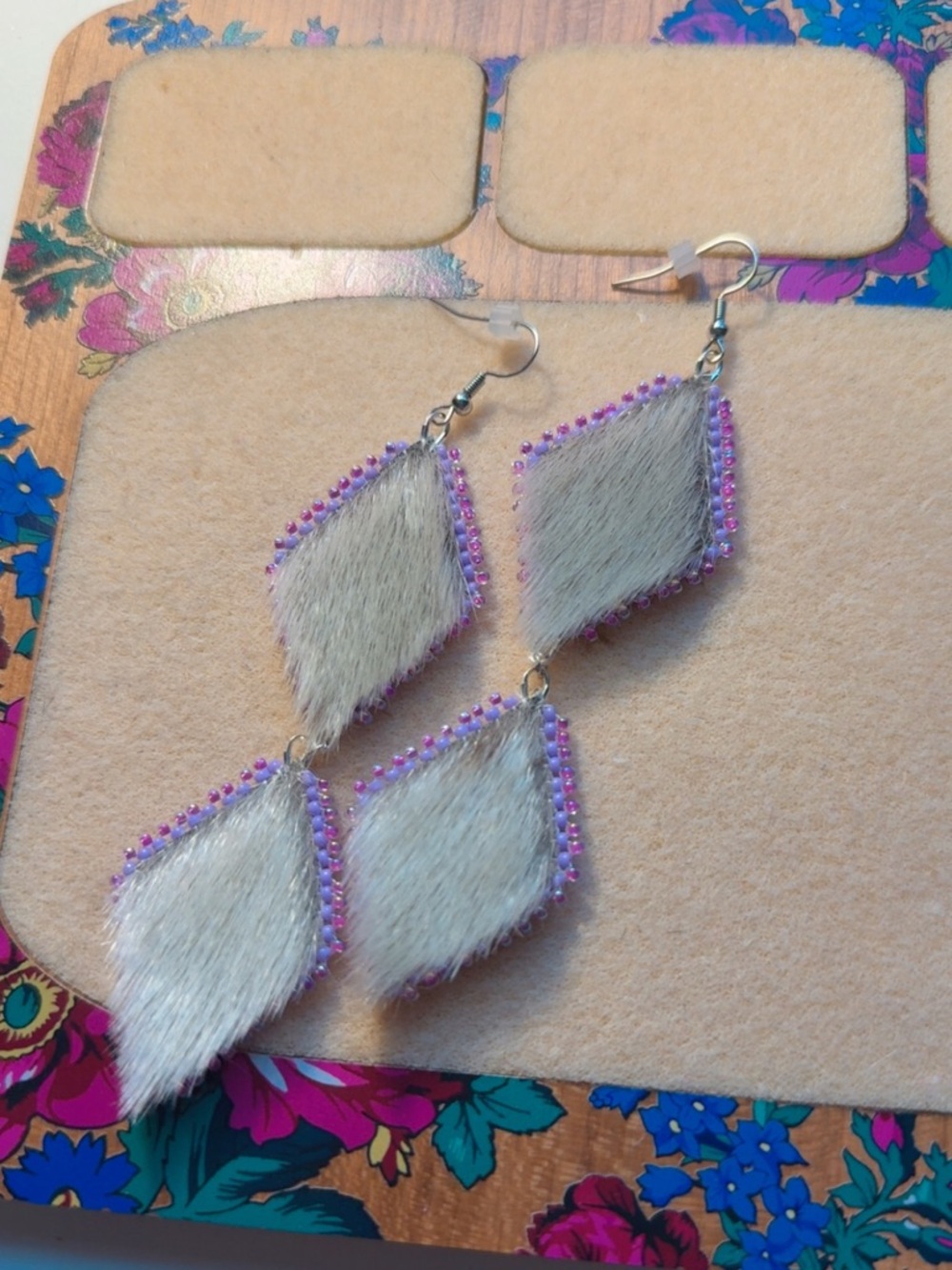 Beaded earrings, with seal skin & caribou hide